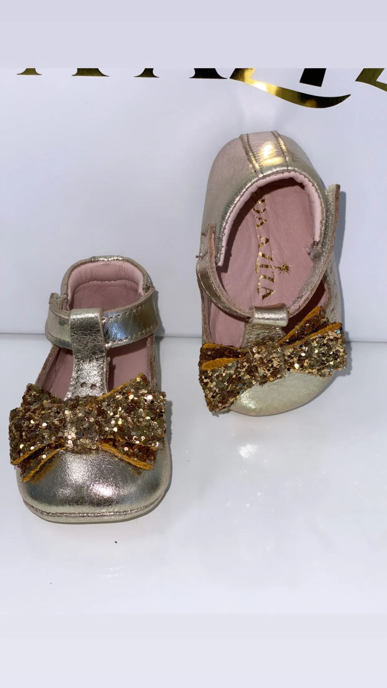 Gold Bow Moccasins