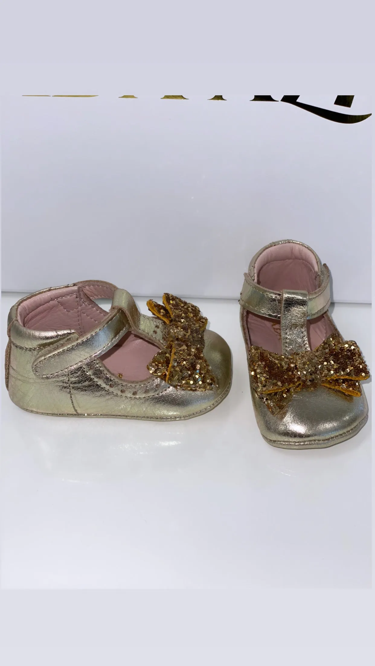 Gold Bow Moccasins